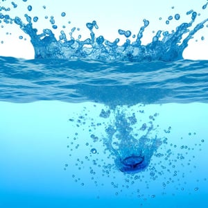 a splash of water with blue water