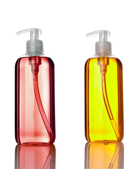collection of various plastic soap bottle on white background. each one is shot separately